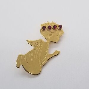 gold tone angel pin with red rhinestone accents
